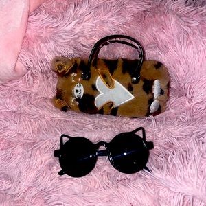 Furry Cat sunglasses case with cat shaped sunglasses.